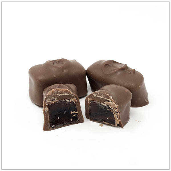 Milk Chocolate covered orange jelly cut in half.