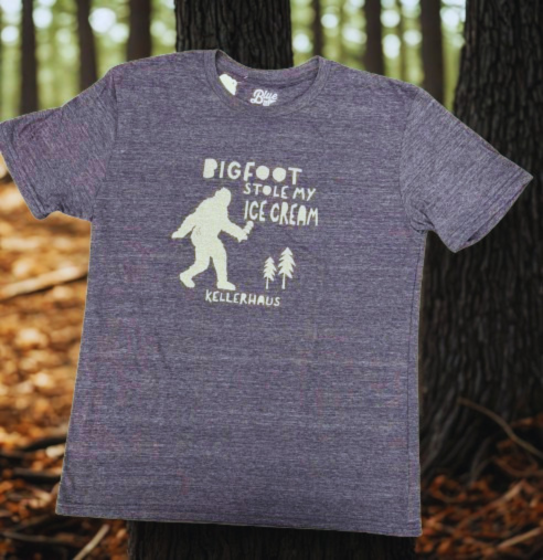 Triblend Navy sleeve t-shirt with a bigfoot silhouette and trees. Words on shirt say Bigfood stole my ice cream Kellerhaus