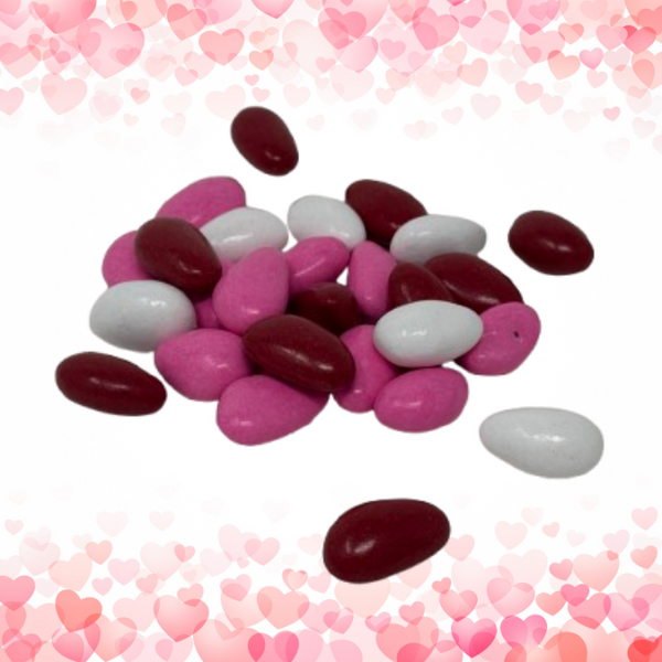 Dark chocolate coated almonds colored pink, white and Red