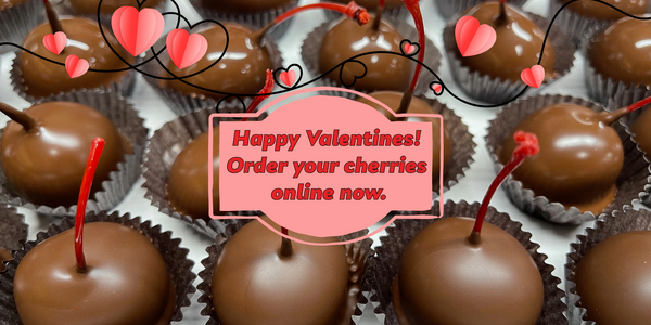 Happy Valentines Order Cherries Sign with chocolate covered cherries in background