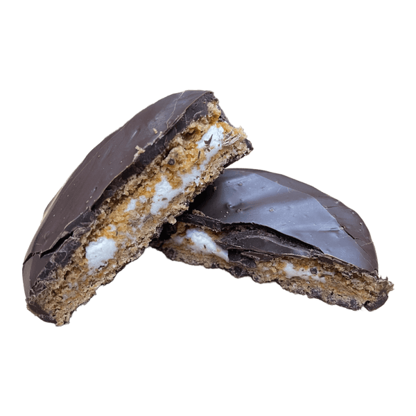 Dark chocolate covered oatmeal cream pie cut in half