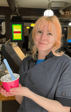 Kellerhaus employee with ice cream in a cup