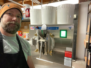Kellerhaus employee in front of the ice cream machine