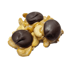 Three dark chocolate caramel cashew clusters.