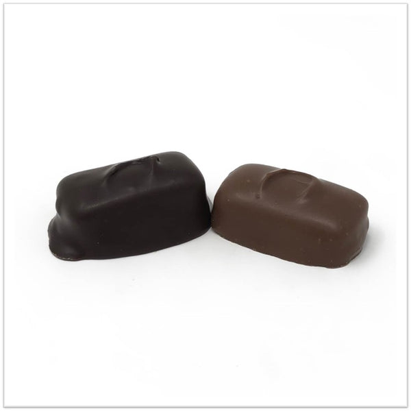 A milk and dark chocolate cherry jelly side by side
